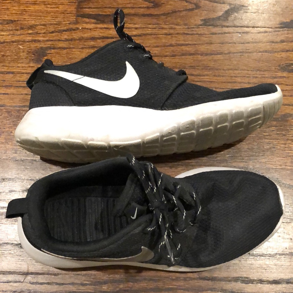 Nike black Roshe Run with silver swoosh